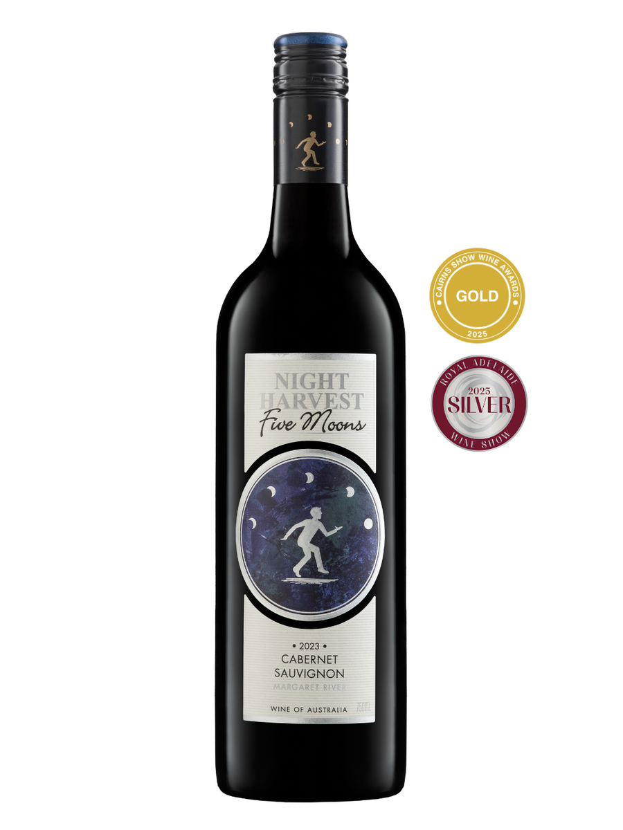 Wine bottle with label and awards on a white background